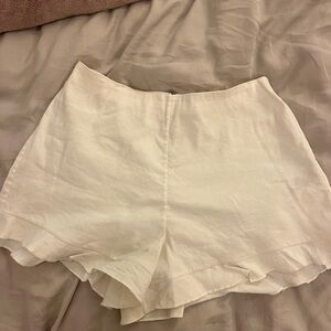 Alice + Olivia white ruffle hem high waisted shorts